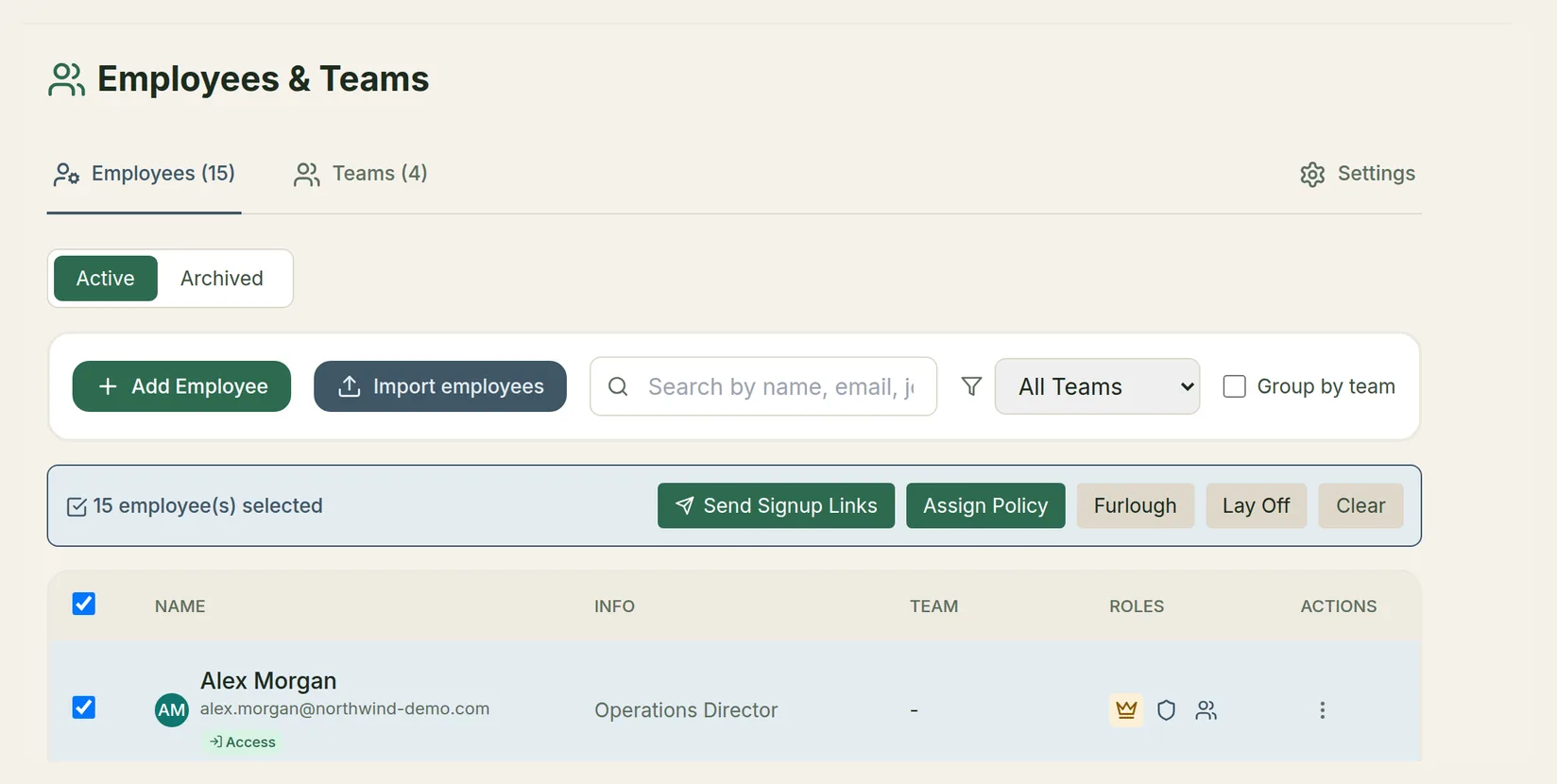 All employees selected, with Send Signup Links, Assign Policy, Furlough, Lay Off and Clear in the action bar